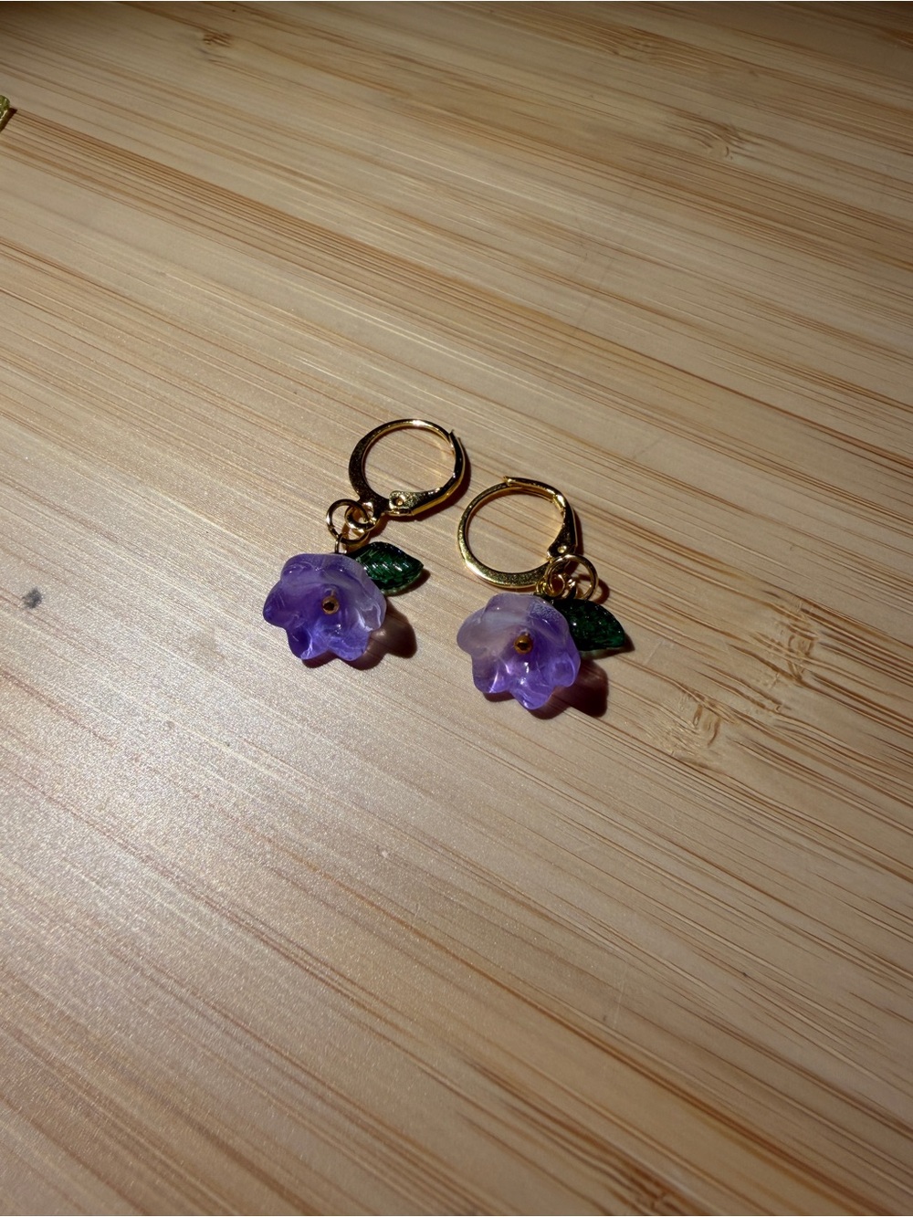 Gold Hoop Earrings with Purple Flower and Green Leaf Charm